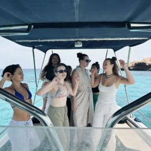 girls dancing in the boat